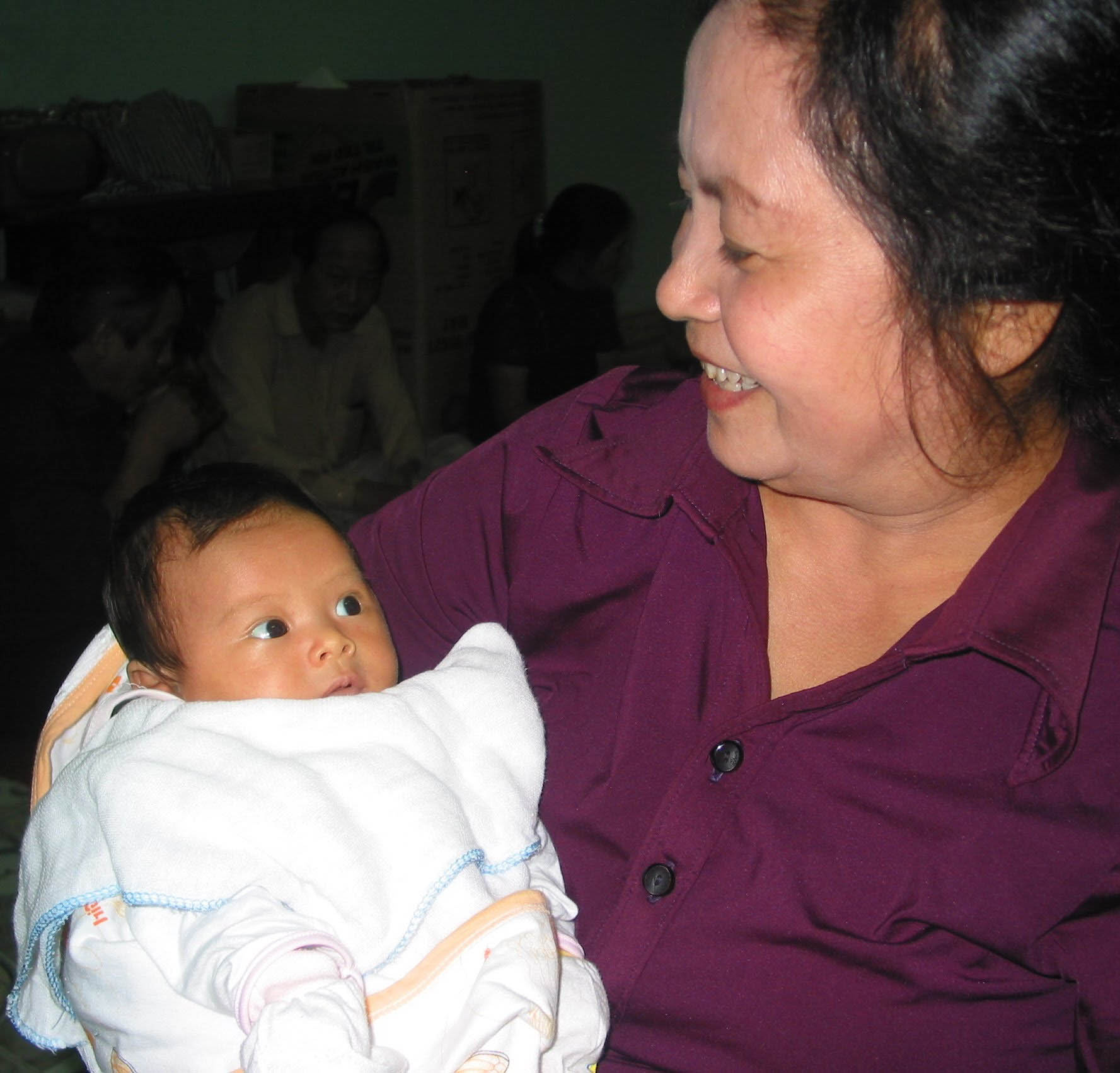 mơ thấy mẹ chồng ẵm cháu